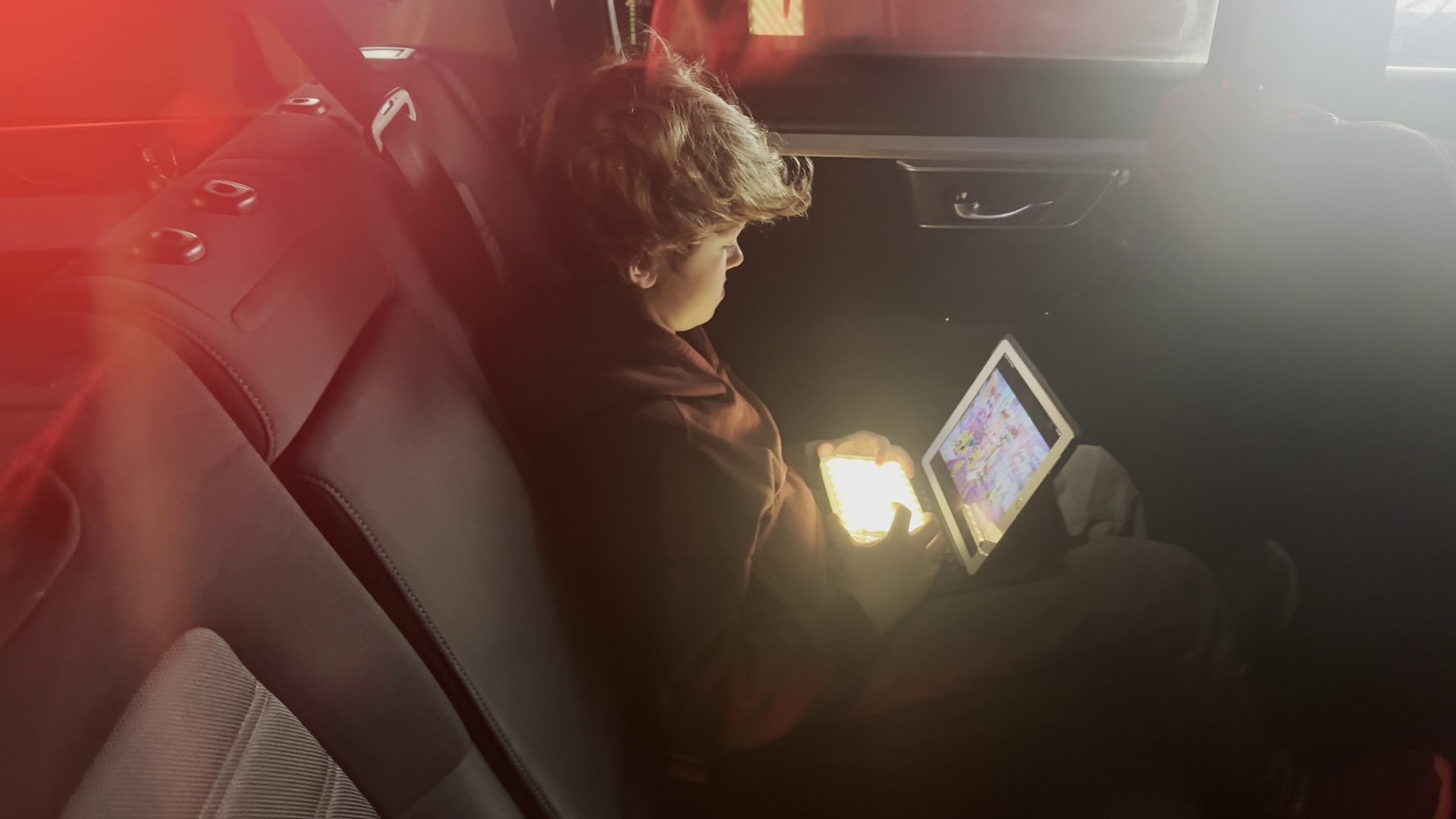 DP rigging camera, profile shot with dramatic lighting