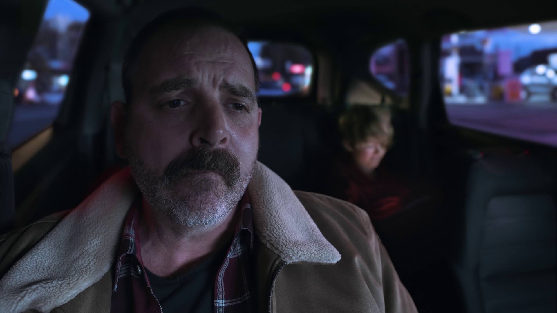 Extreme close-up of father's face, cinematic lighting